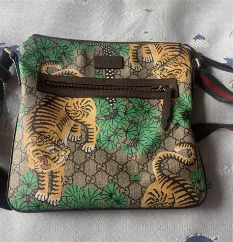 gucci green bag with tigers|Gucci tiger messenger bag.